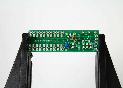 Insert the resitor and the 100n capacitor