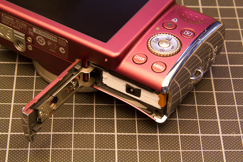 Insert the battery adatper